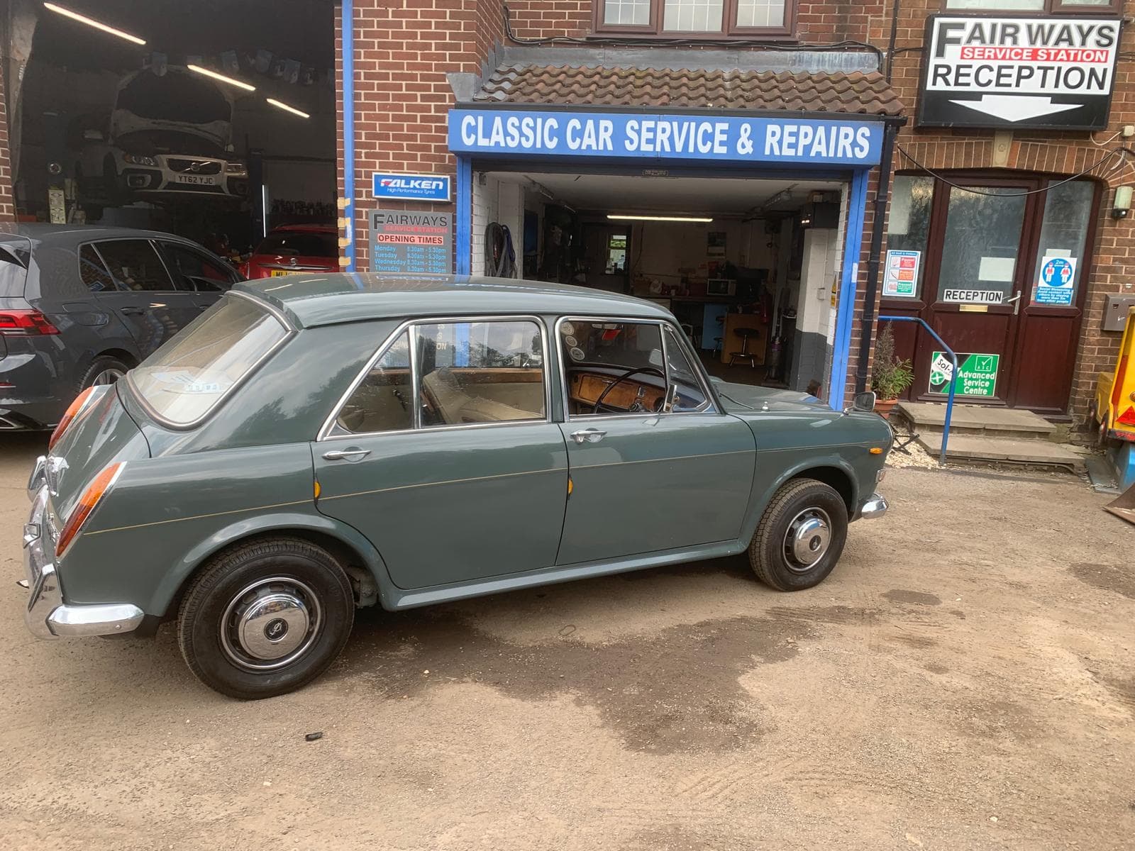 Classic Austin 1100 in the workshop bay for traditional mechanical work