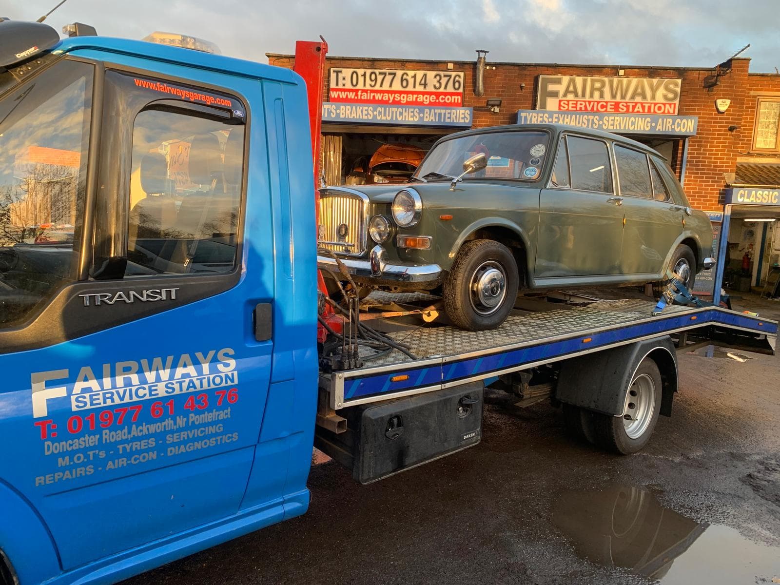 Fairways recovery truck recovering a classic Austin